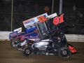 Action-Photos-Tyler-Schullick-61-and-Dustin-Stroup-12-get-together-during-the-305-sprint-feature