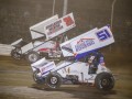 Action-Photos-Scotty-Thiel-51-Puts-Larry-Kingseed-Jr-21-a-lap-down-on-his-way-to-taking-the-checkered-flag-before-being-disqualified-for-a-2-inch-Wicker-Bill