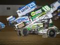 Cole-Macedo-18-pulls-a-wheelie-racing-in-traffic